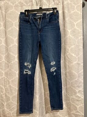 Levi's Mid Blue Distressed Skinny Jeans